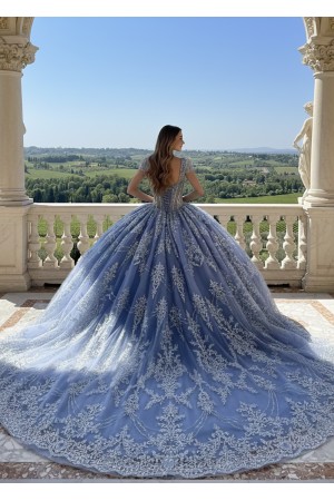 PQ1110-L<br/>A stunning dusty blue quinceañera ball gown featuring an intricately embellished bodice adorned.